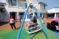 Portique balançoire PMR accessible aux fauteuils roulants