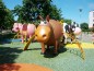 Structure de jeux "la vache avec toboggan et filet à grimper"